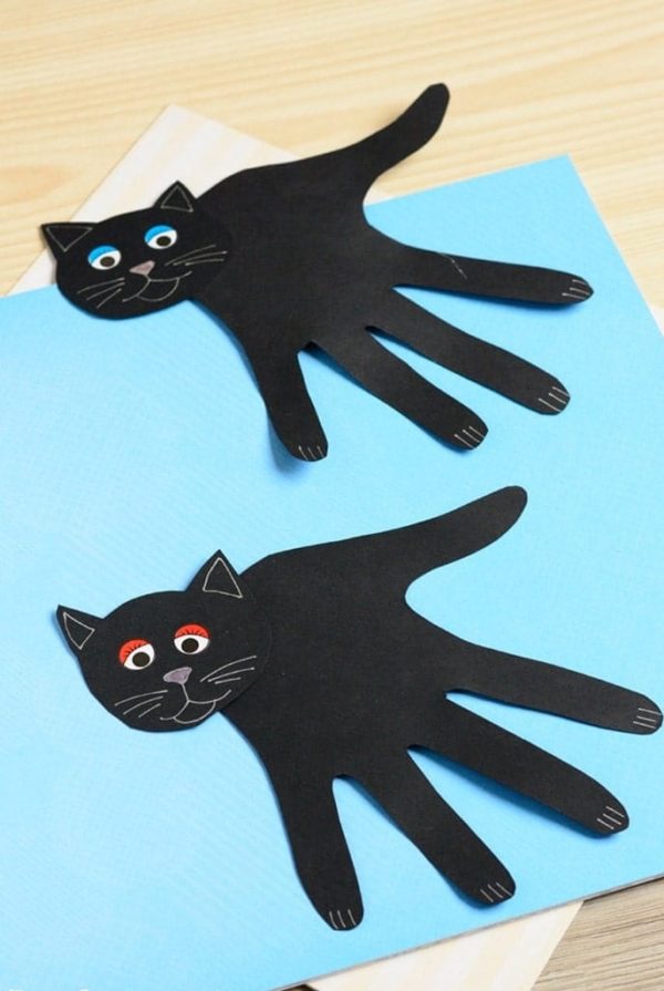 Mejores manualidades dia internacional gato con manos
